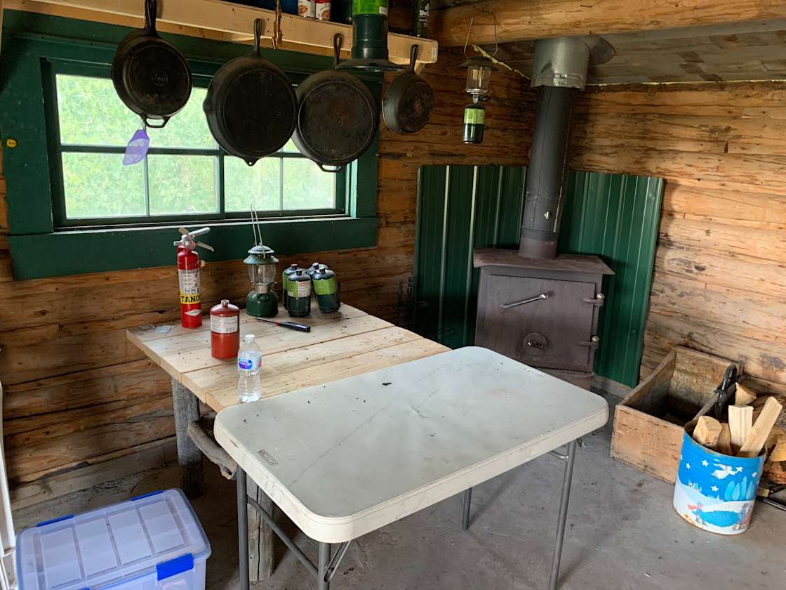 640 acres with rustic cabin on a creek bank. Cabin has no electricity