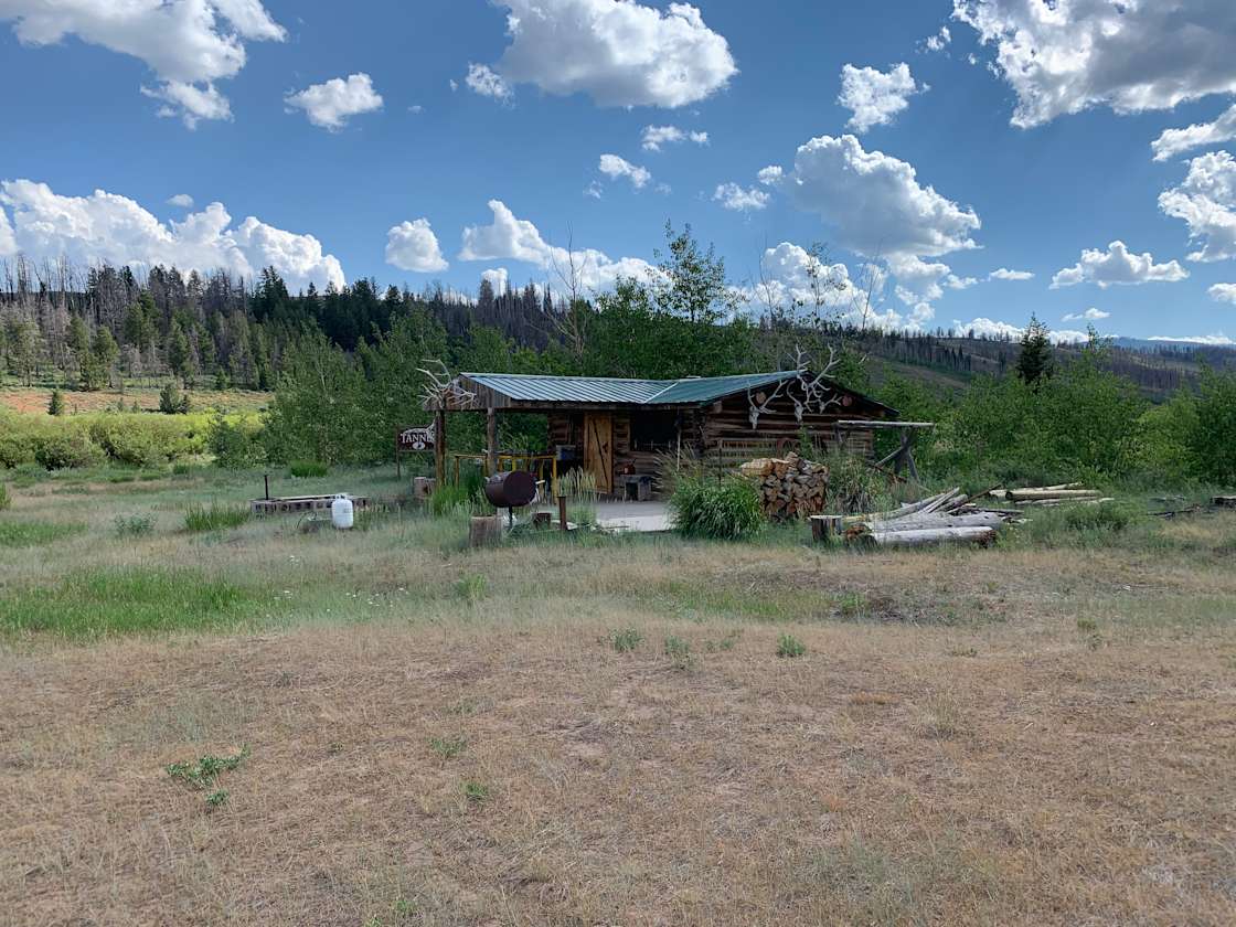 640 acres with rustic cabin on a creek bank. Cabin has no electricity