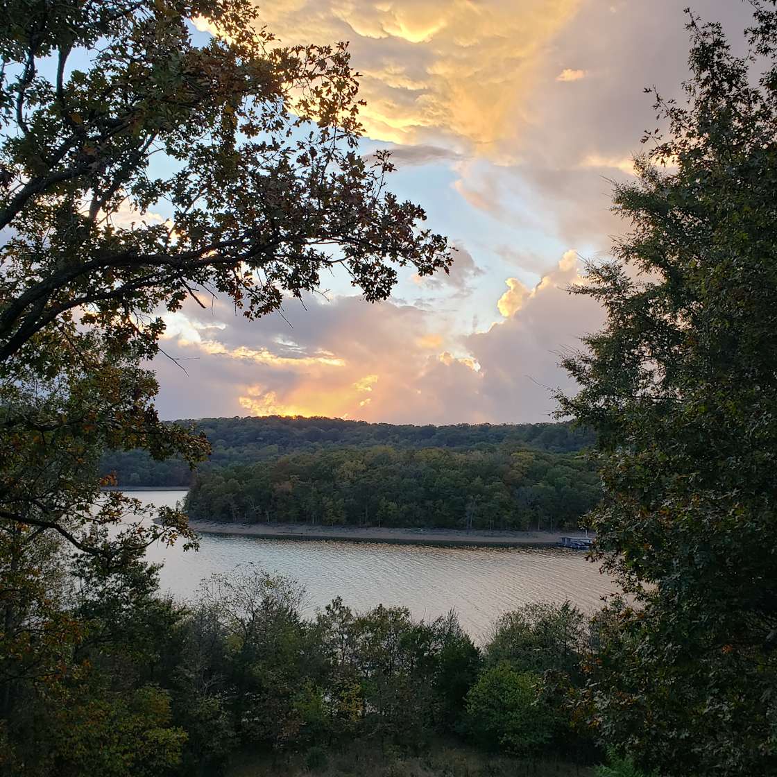 Overlooking the lake Hipcamp in Garfield, Arkansas