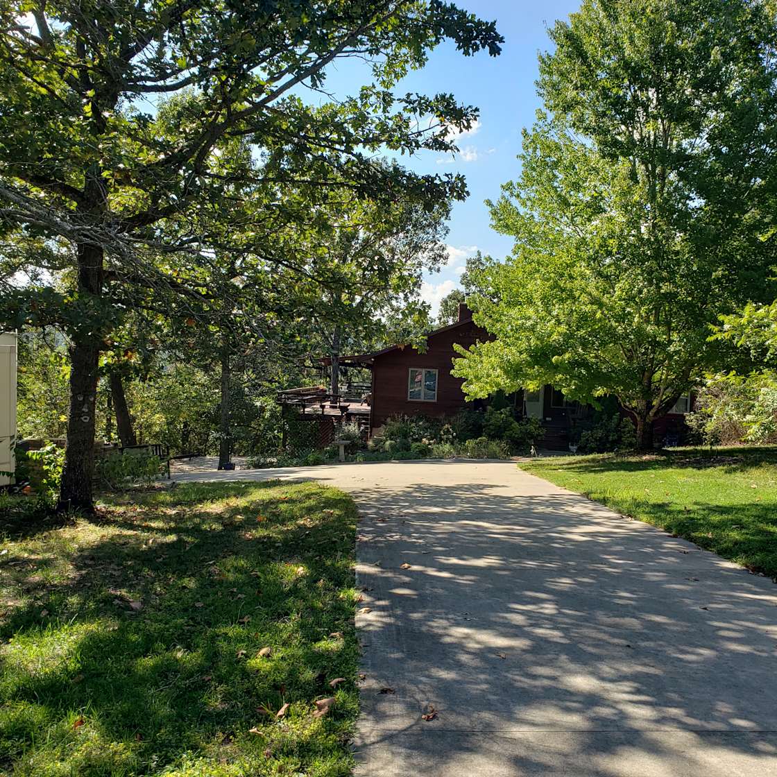 Overlooking the lake Hipcamp in Garfield, Arkansas