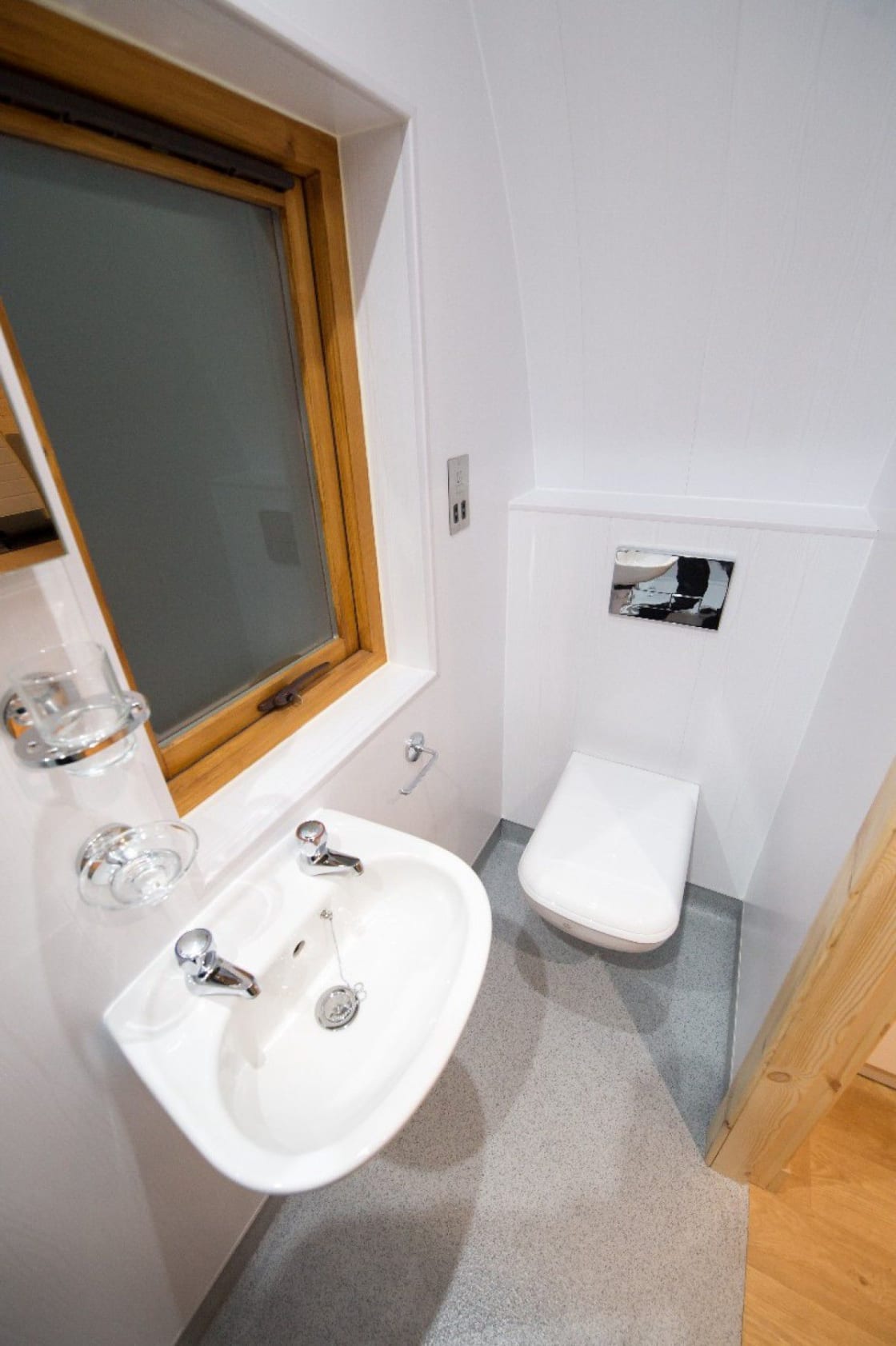 Bathroom with basin and toilet