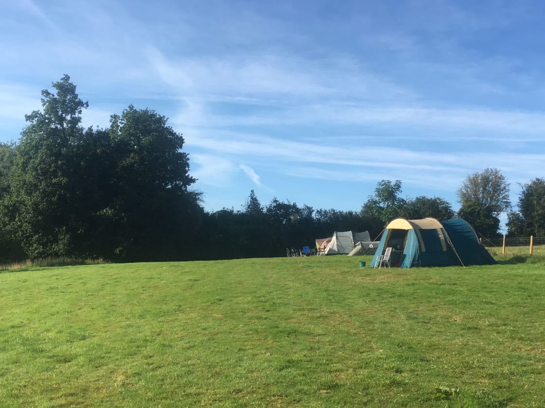 A grass pitch with incredible views on a small, family run glamping and camping site located in the beautiful Teme Valley.