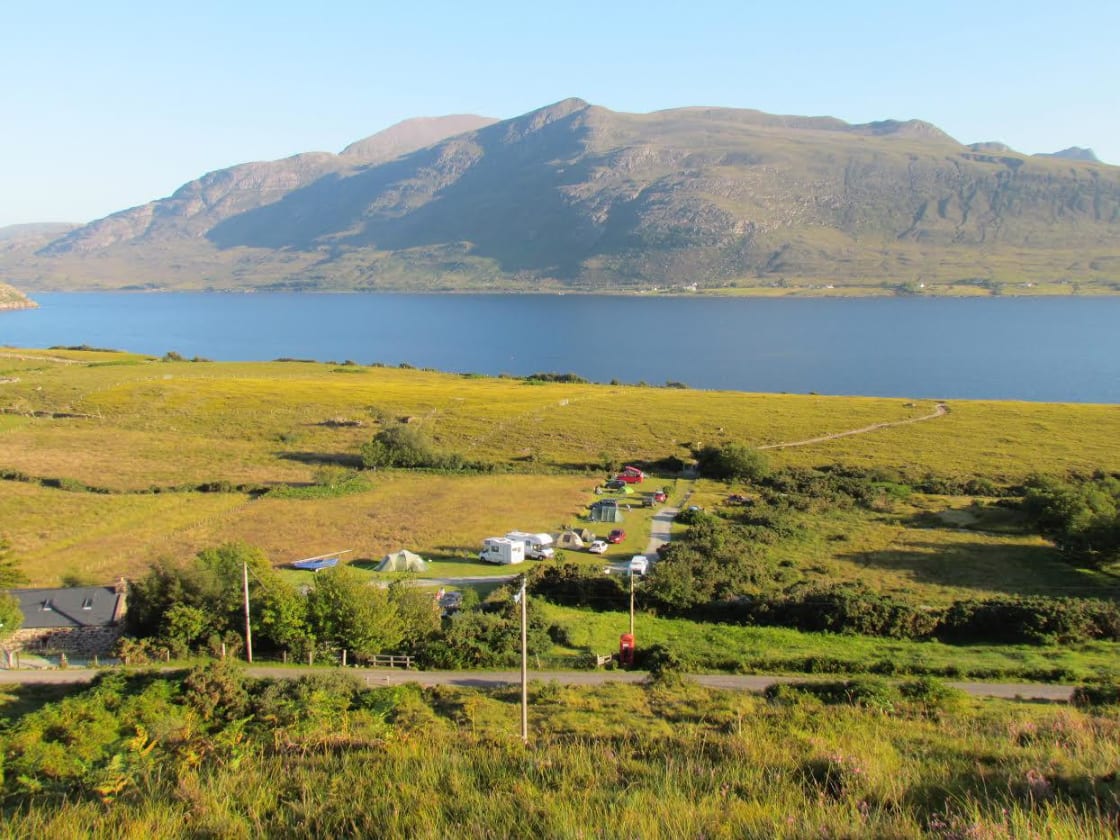 Lochside camping in Scotland - a big grass camping pitch with big views!