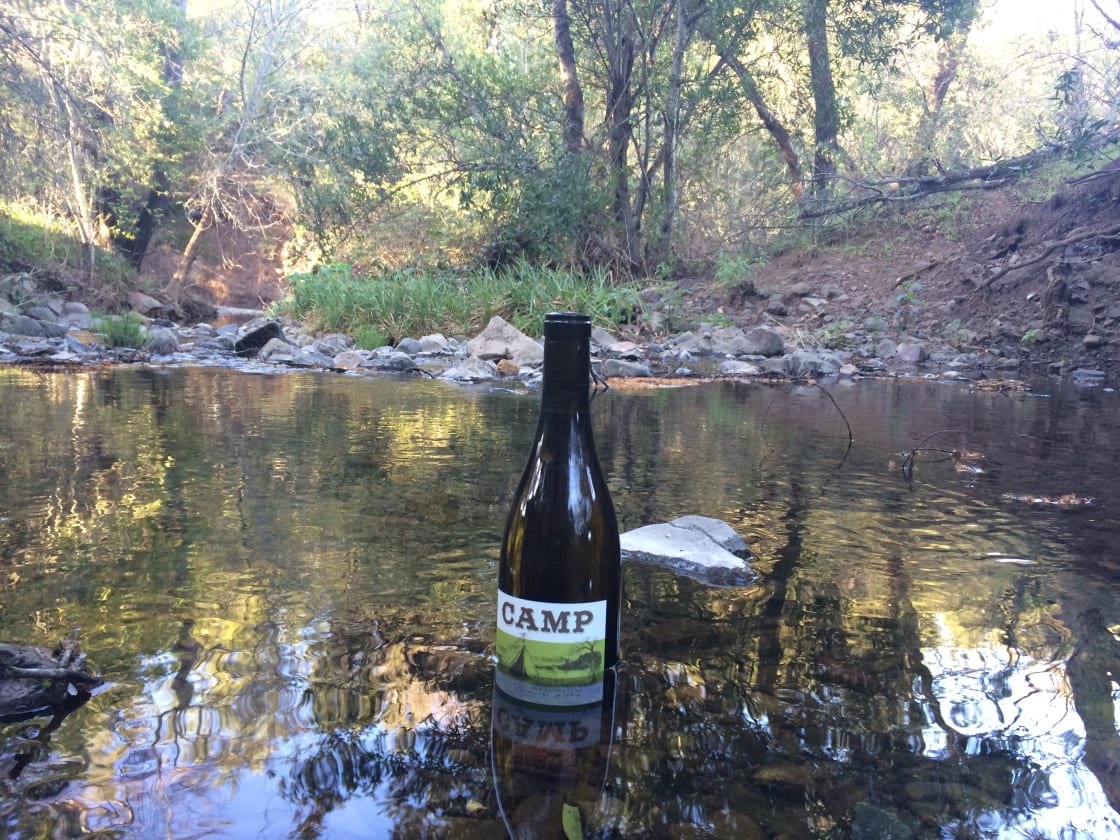 Campsites are nestled up to a little creek. Refreshing for your toes or your wine. 