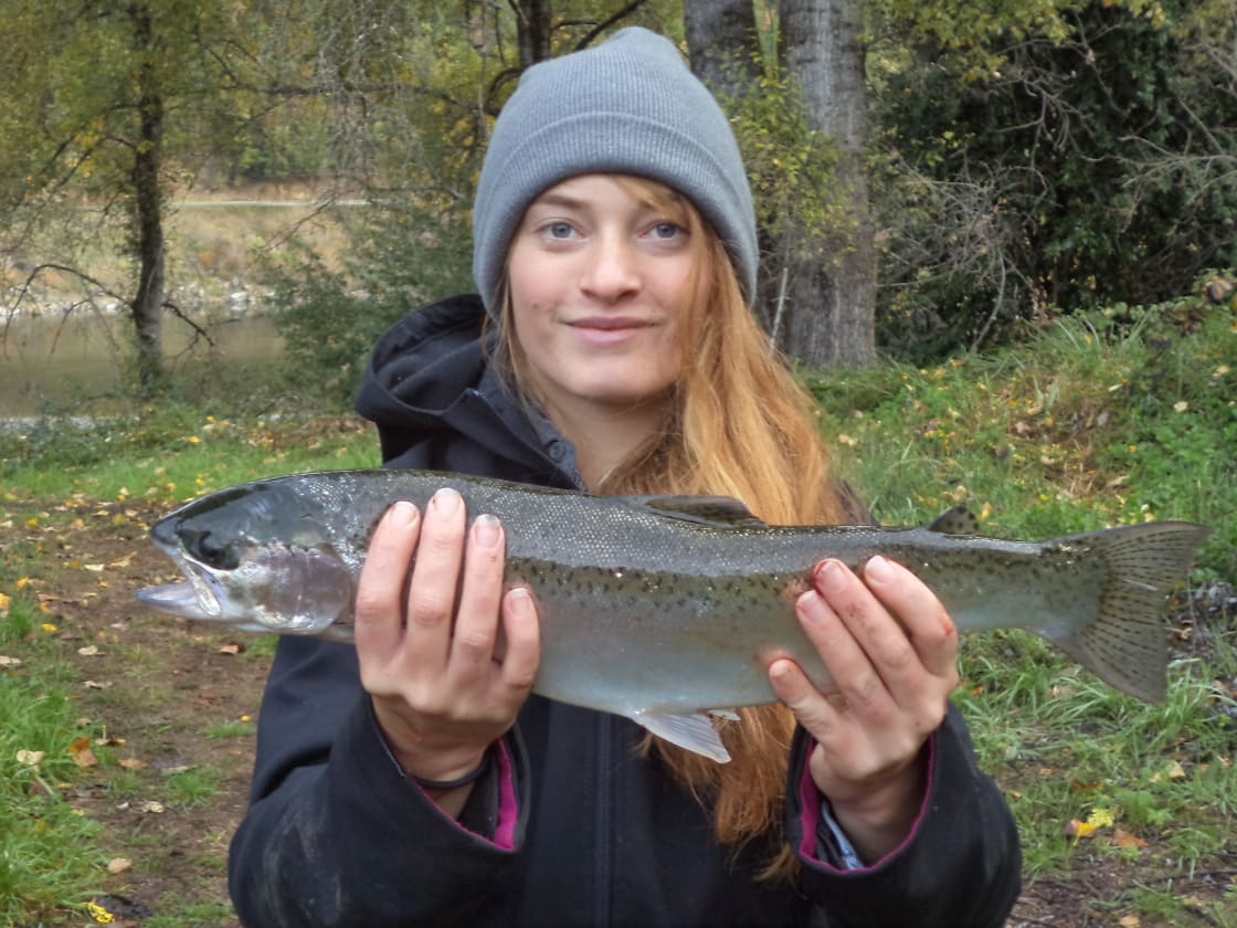 Kelsey with a salmon she caught at Otter Space