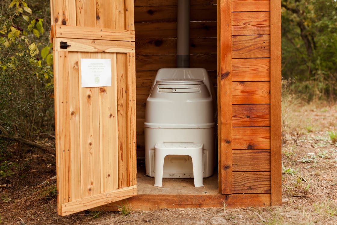 The outhouse has an odorless, composting toilet