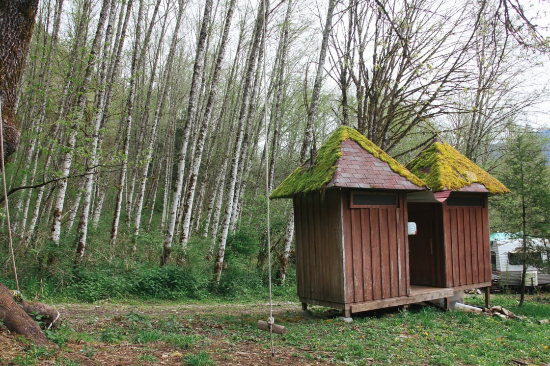 Outhouses are located just across the driveway.