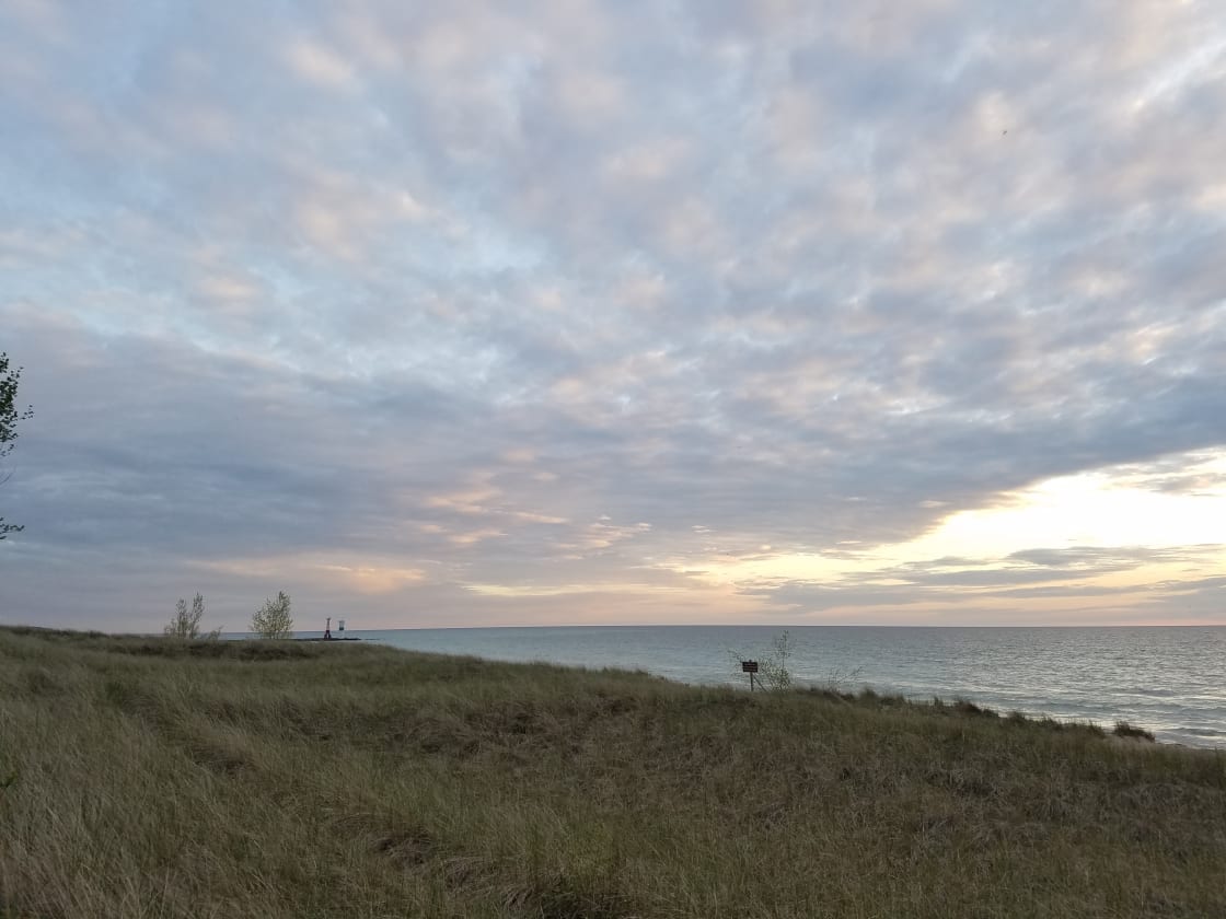 View south along the Lake Michigan shore at dusk. 30 steps from campsite.