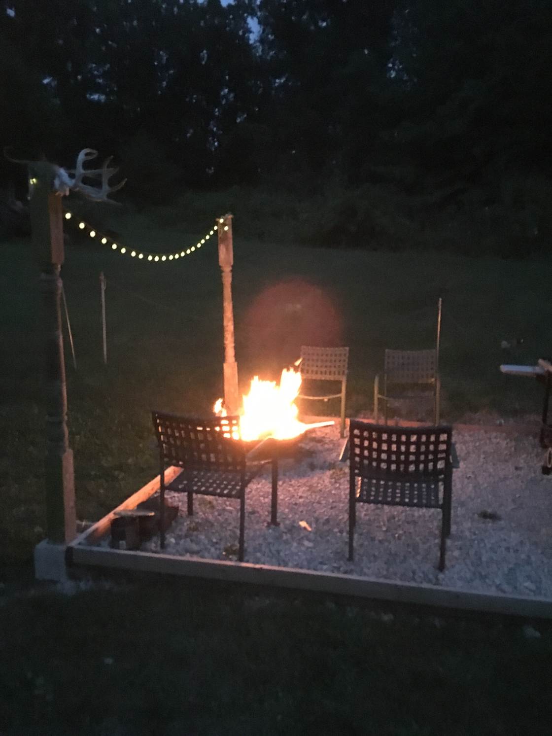 Community fire pit, at dusk.