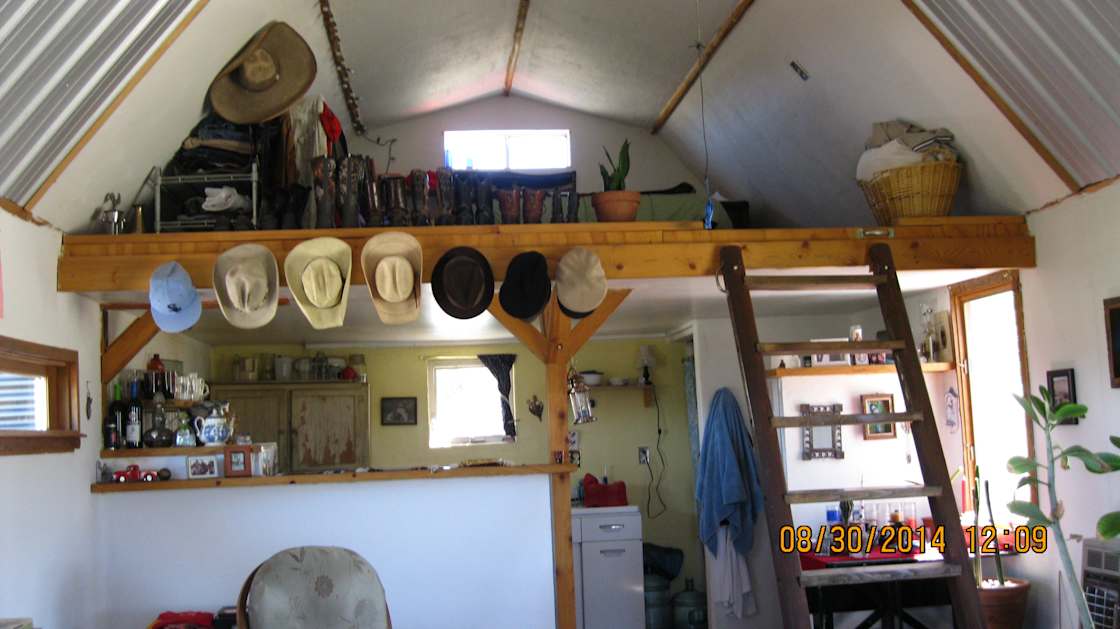 Loft area, kitchen and shower below loft.