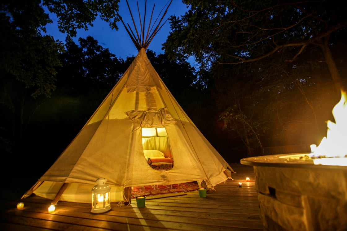 Light up your nights in our charming woods and watch the fire from your super comfy queen-sized bed.