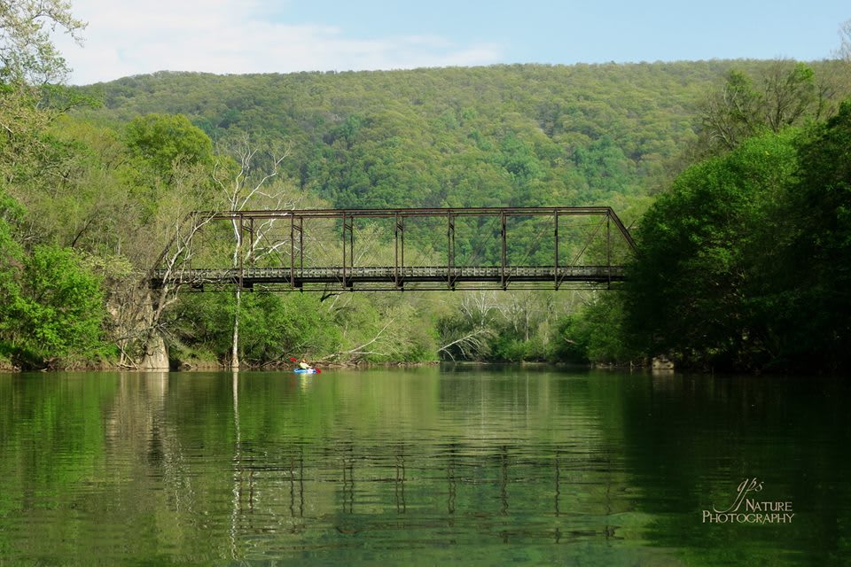 A short paddle up river to this 100 year old private bridge.  I mile down river is a dam creating a beautiful deep water private for paddling, fishing or swimming. This is my favorite picture of the river meeting the Massanutten Mountain.