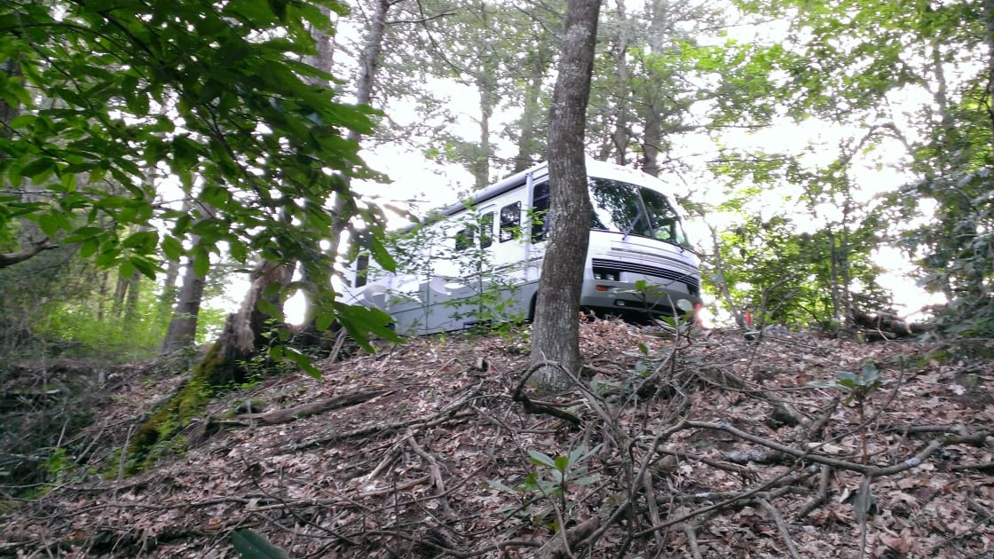 Looking up at our 38' RV from down the cliff