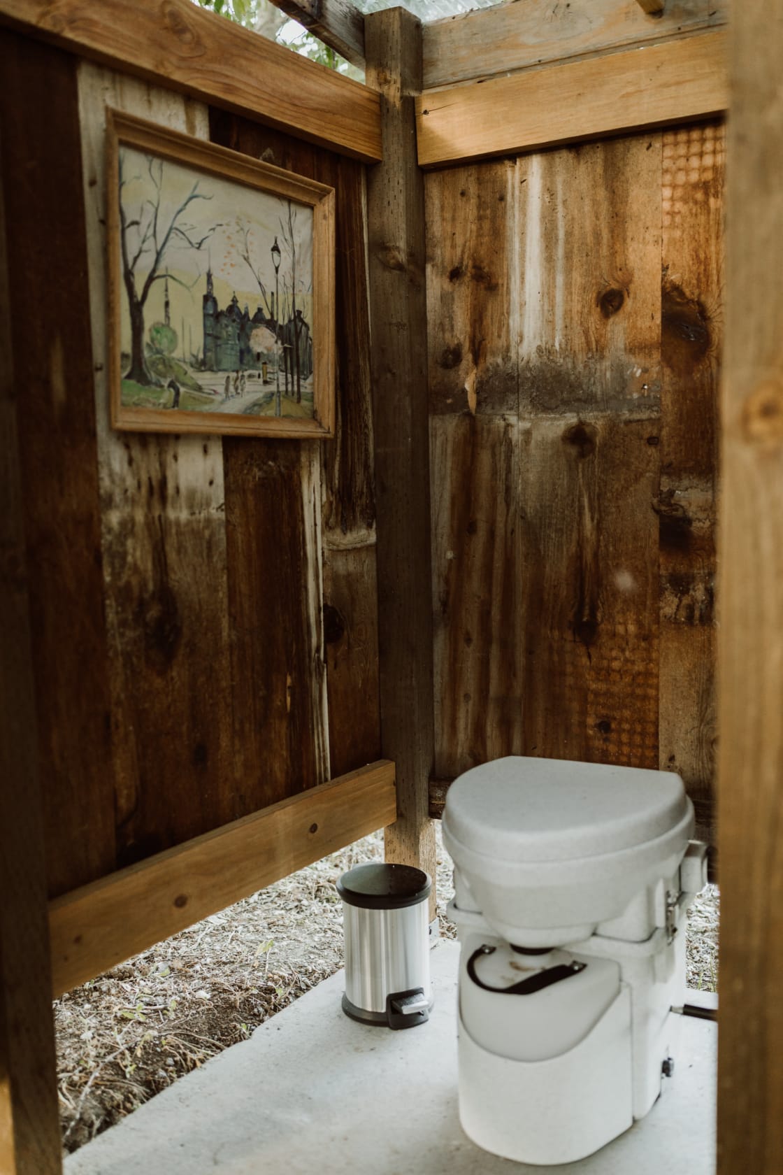 Nature's Head compost toilet is super easy to use and the art inside makes it feel homey!