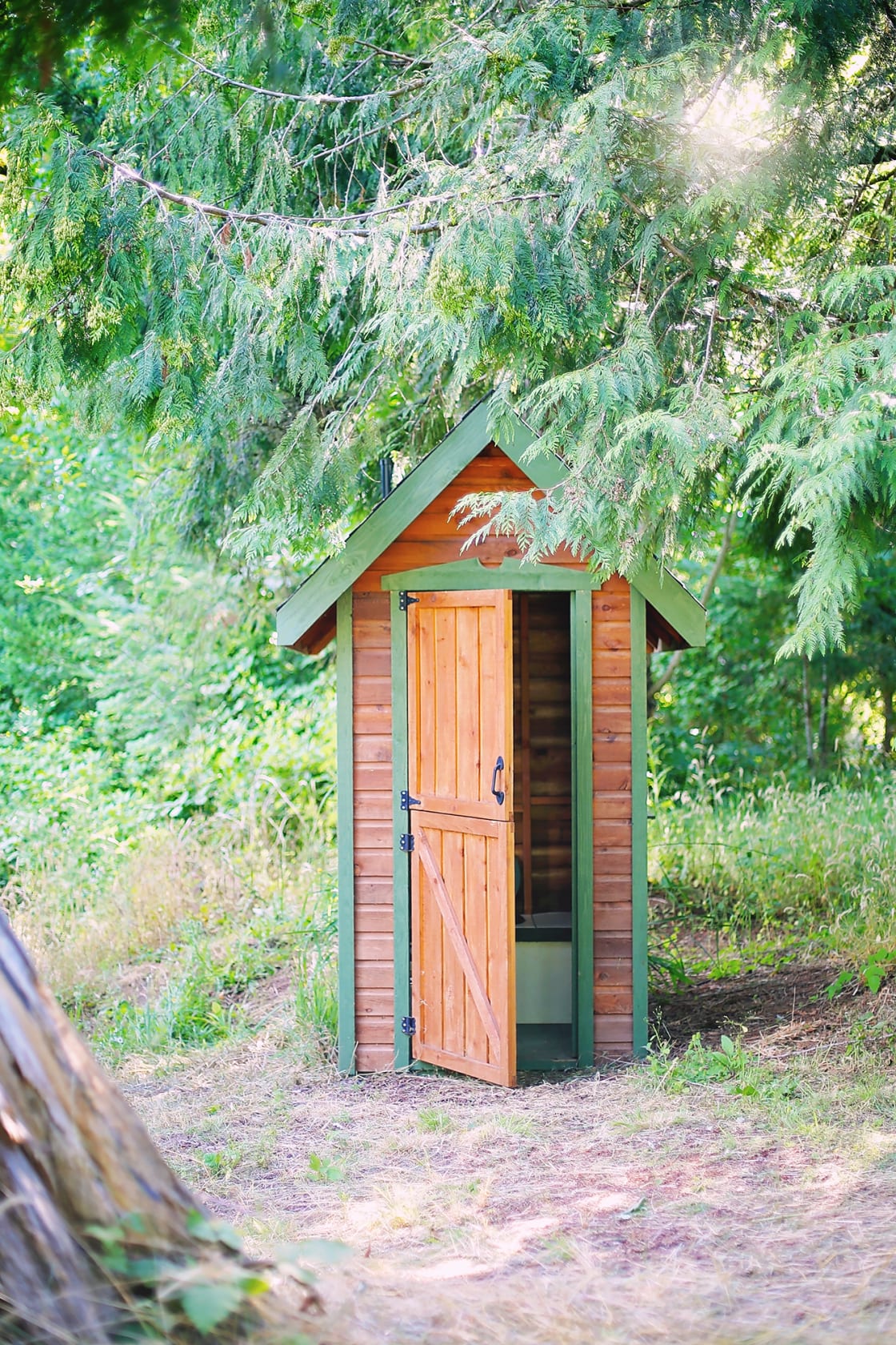 The cutest most clean outhouse that has a compost toilet with a wonderful view 