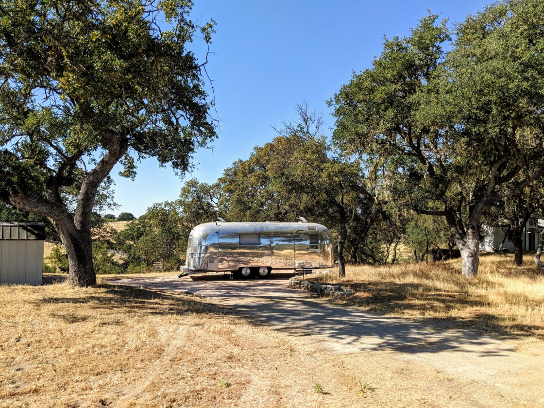 Zeppelin sits on her own concrete pad surrounded by moss covered oaks and with views of rolling hills, vines, and wildlife. 