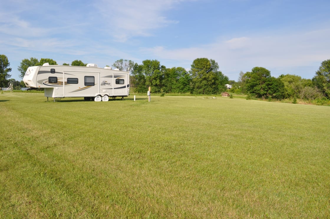 2+ acres to spread out.  RV in the picture is not included and is only shown for example purposes.