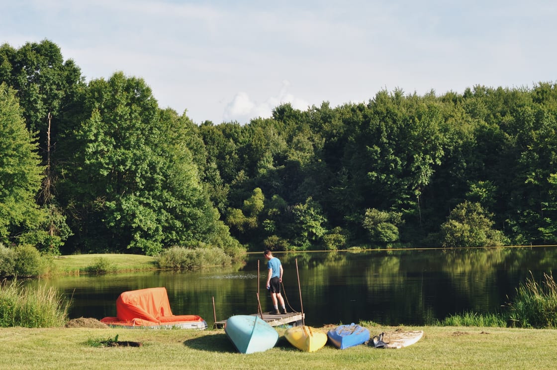 kayaks, a canoe, paddle board and even a floating tent available to guests. 