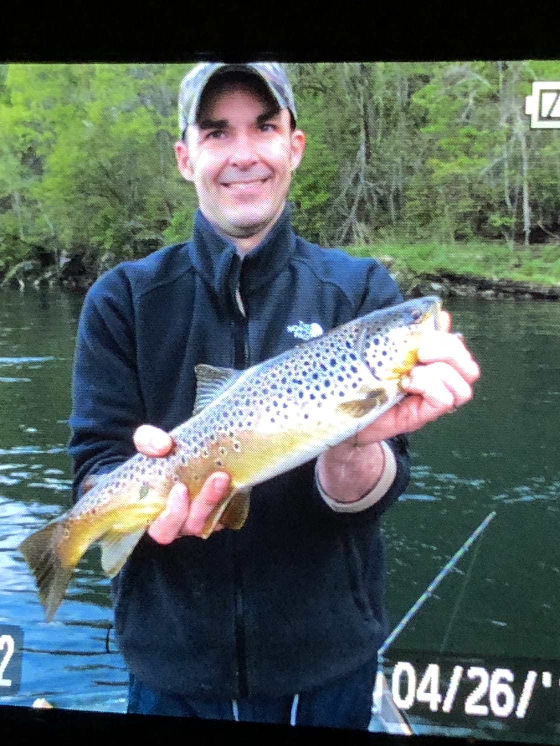 rivercliff customer with brown trout catch
