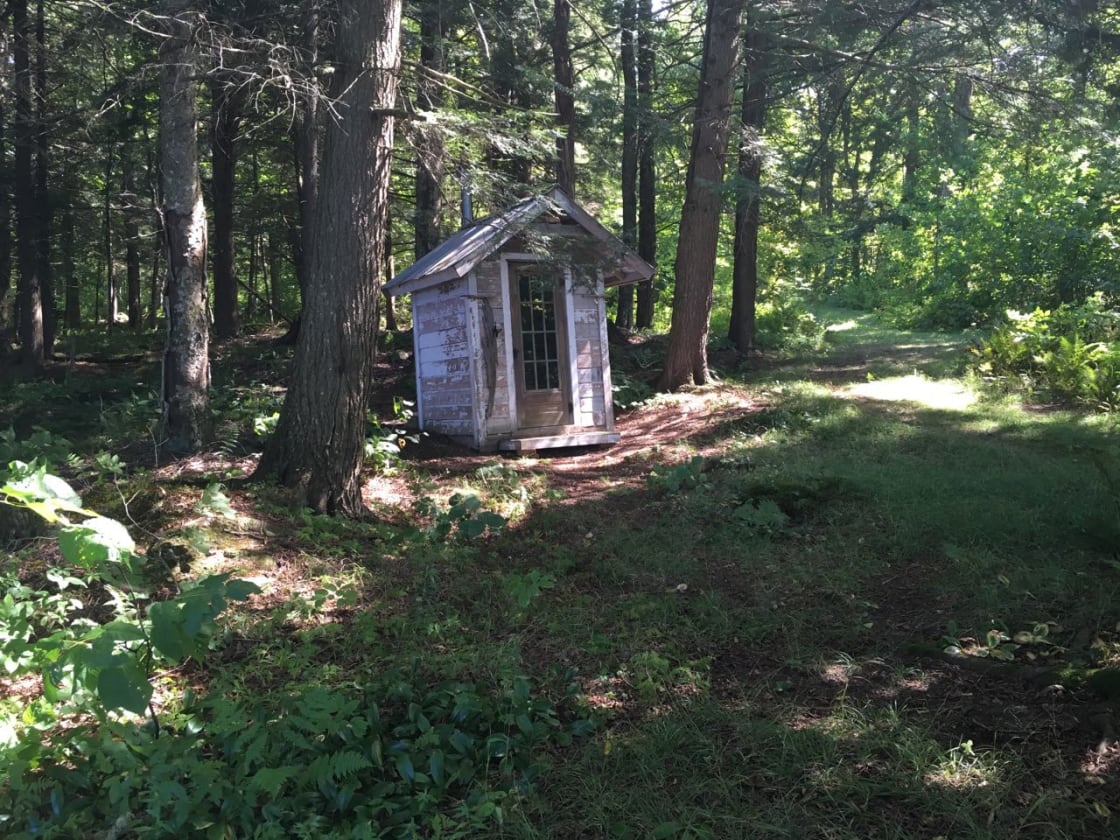 The Caretaker's Cabin outhouse