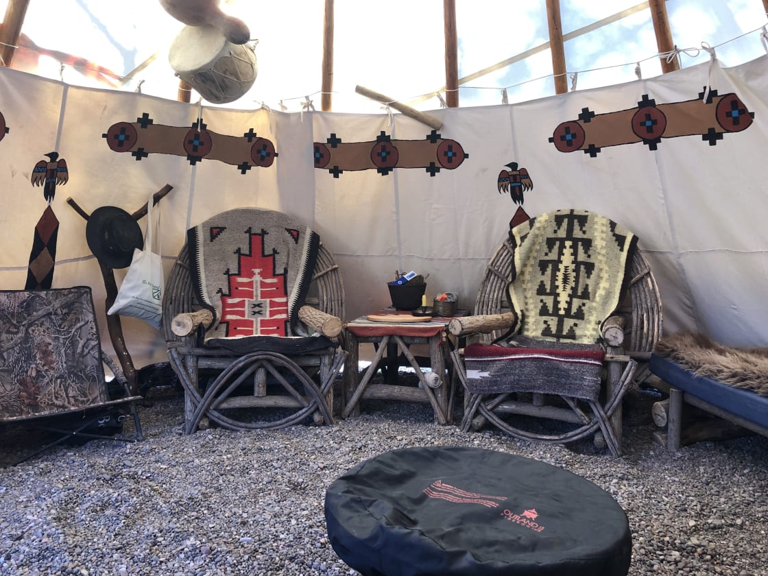 Comfortable chairs and beds in TIPI