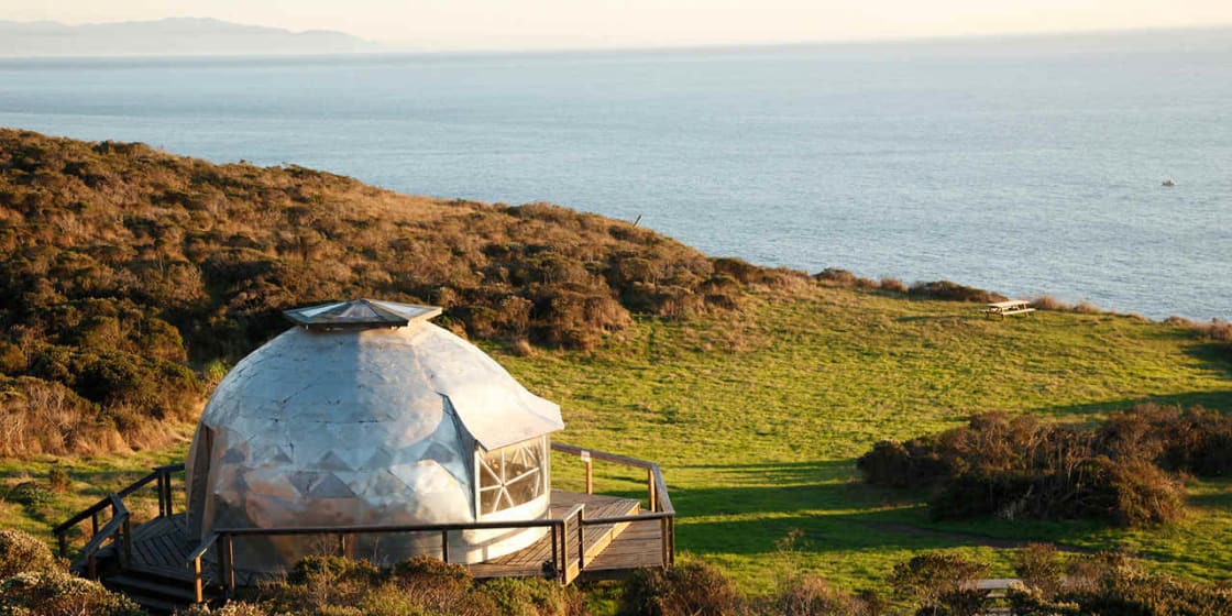 Our Glamping tents are located in our Dome Campsite Meadow overlooking the ocean.