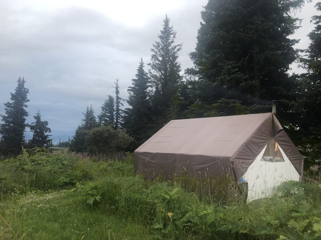 Picture of the ‘wall tent’ we stayed at— there is a wood stove inside and is really charming.. perfect camping experience where you can stay dry and comfy inside yet still camping 