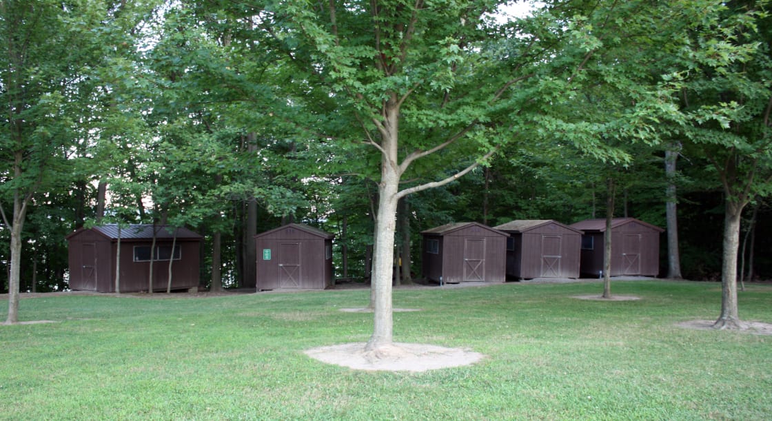 Our camper cabins are clustered together in one area, near our Main Lodge building and close to the lakefront.