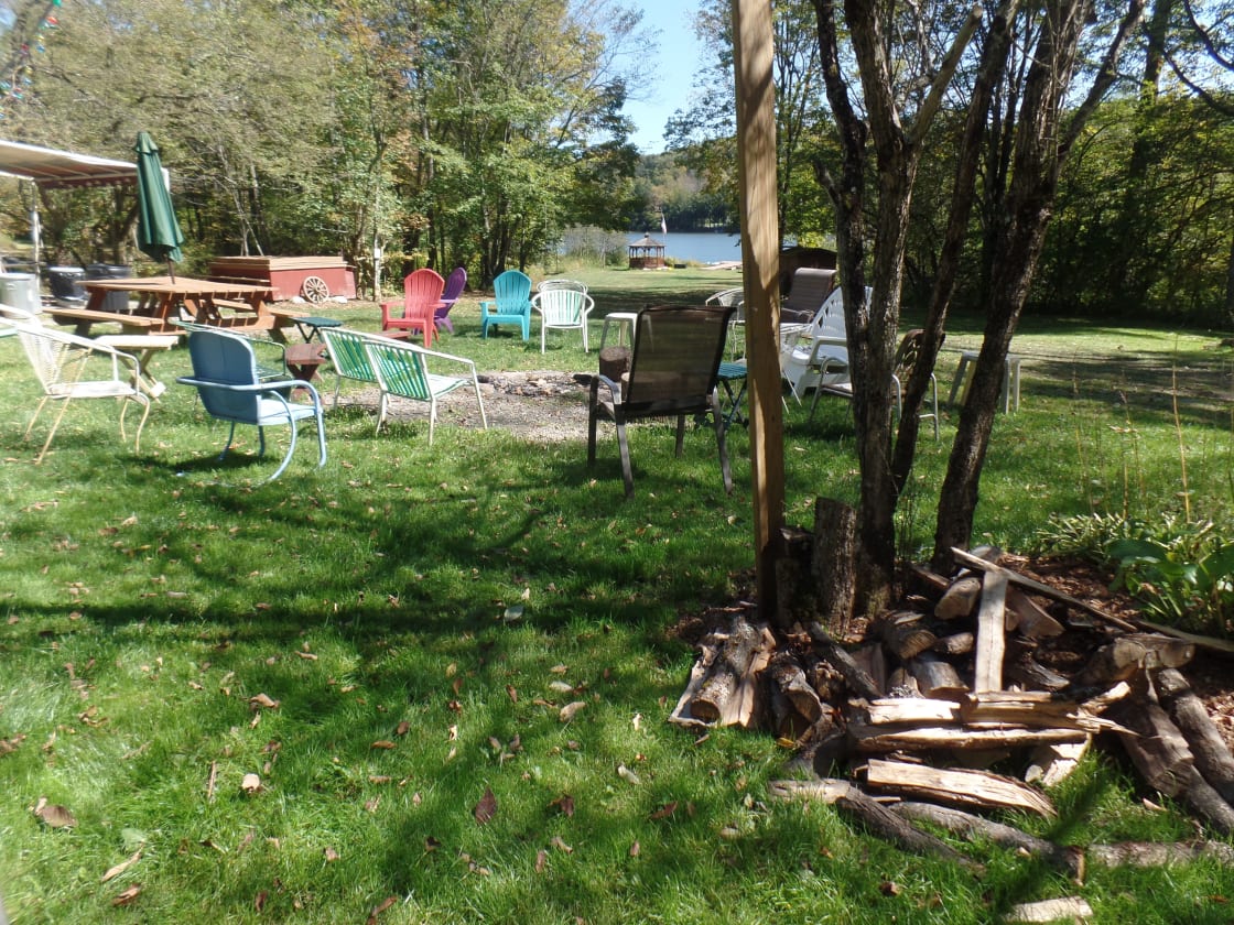 Firewood and campfire seating area