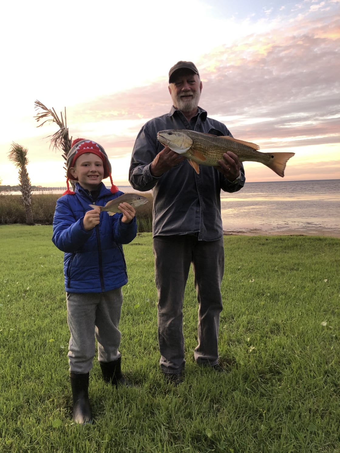 A big slot red and a little mangrove snapper caught October, 2019.