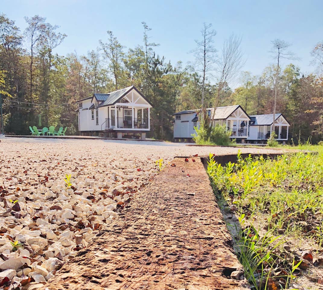 Dolly Parton is featured on the far right, nearest the pond. Each of Arrow Acres's tiny houses is named after a legendary singer-songwriter in country music.
