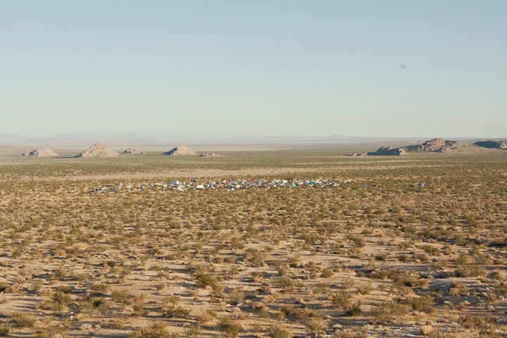 View from about a mile away, showing people 'gathered' at the site in front of The Buttes (aka '3 Peaks')