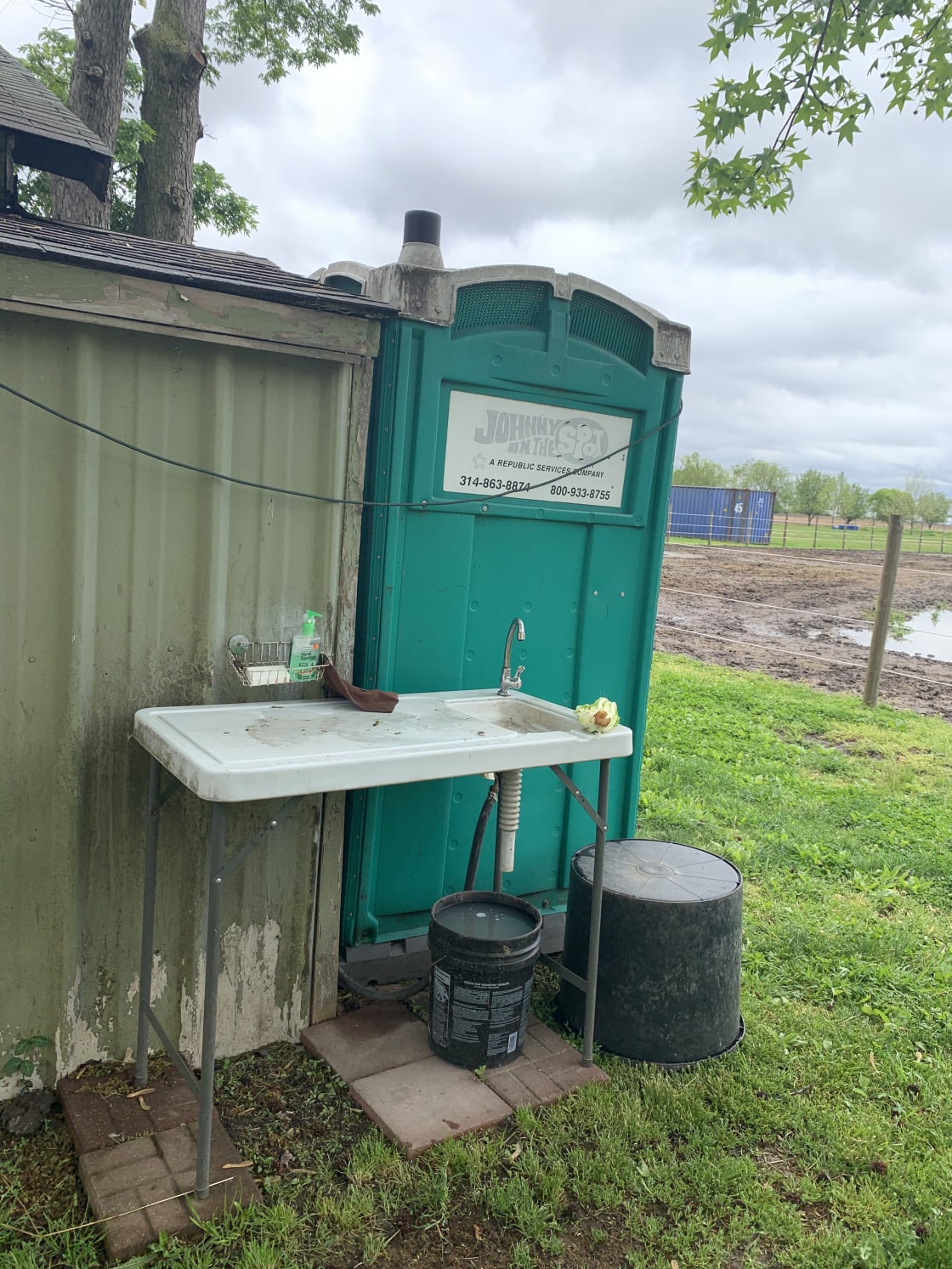 Wash station and porta potty.  Wash station is cold well water only.  