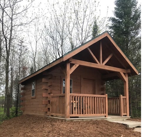 beautiful 12 x 20 log cabin with south east facing front porch