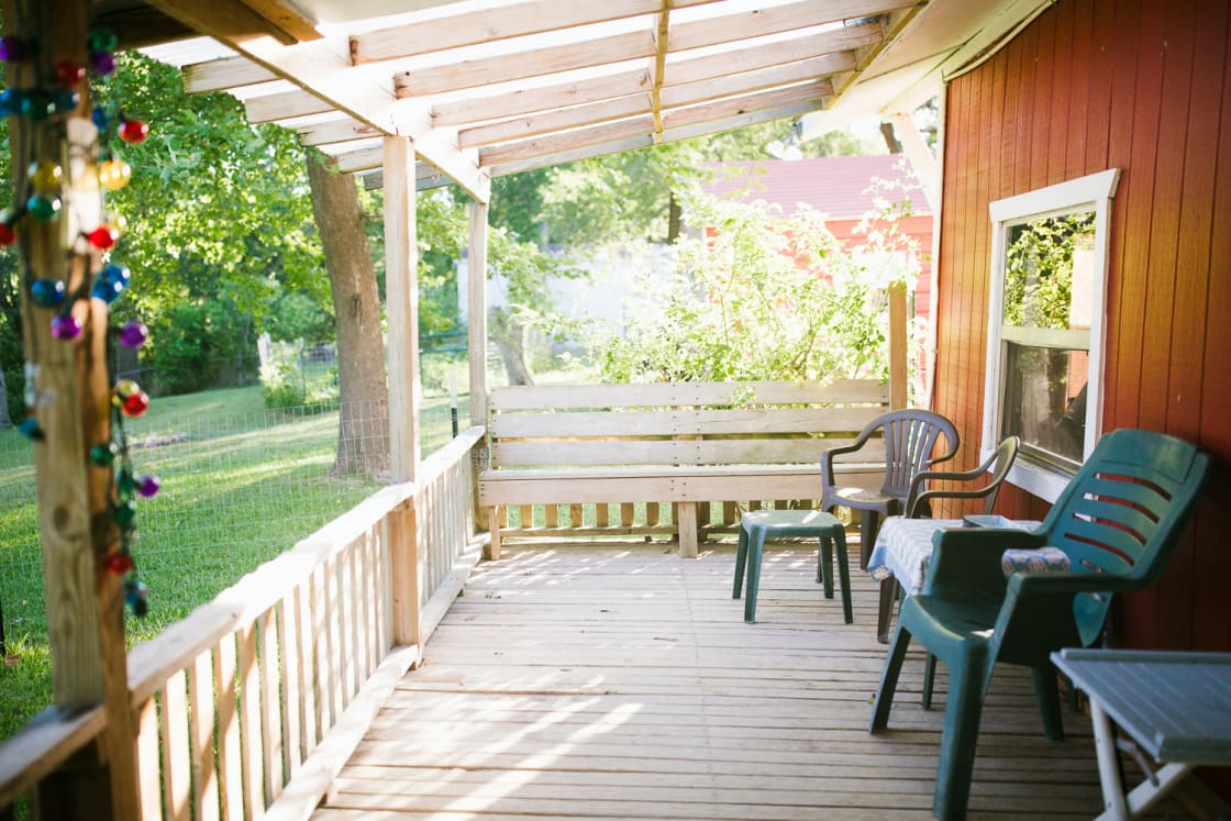The back porch overlooking the yard and river.