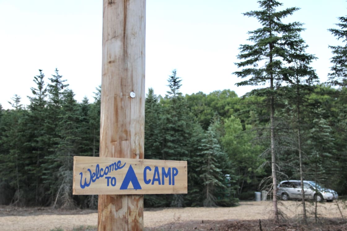 Find the entrance to camp off our the farm's driveway marked by the "Welcome to Camp" sign