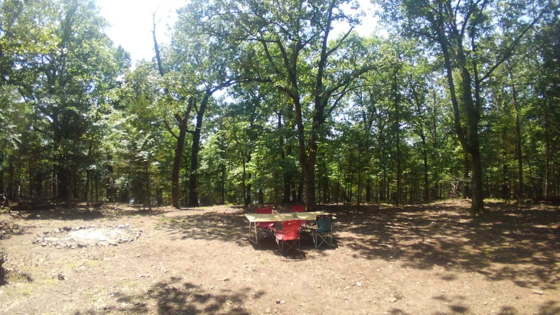 Our campsites are pretty big, much larger than typical campsites. Each one comes with a table & chairs/benches and a fire pit. 