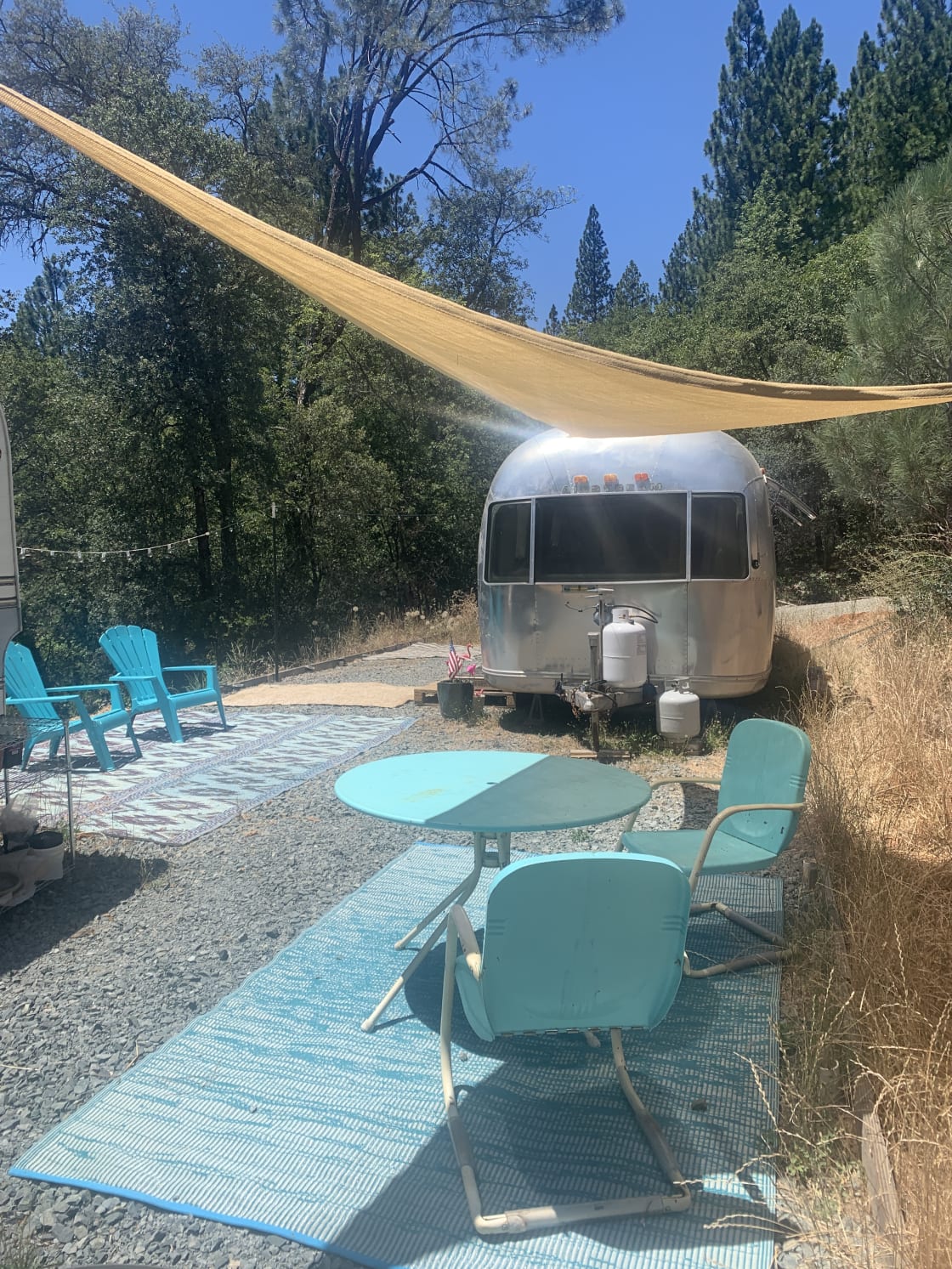 Coco the Airstream and outdoor dining area