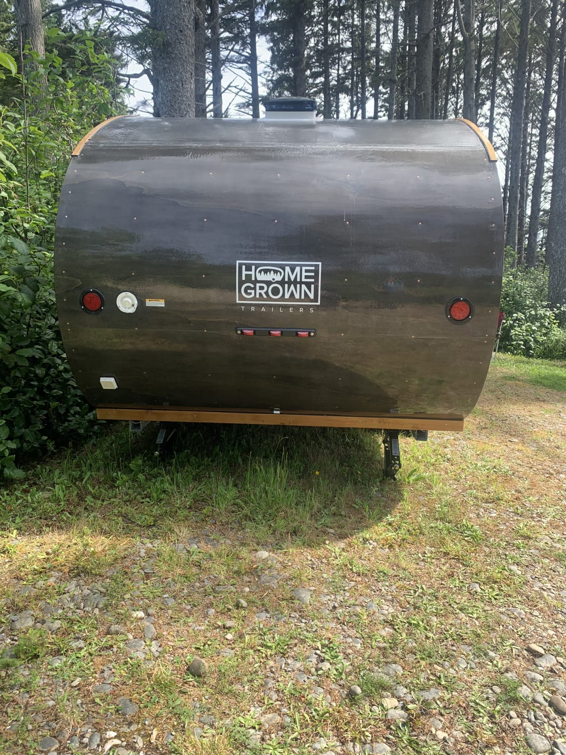 One of the Home Grown trailers that can be rented. These are the closest to the ocean. Cars can not drive right up to these. They have to park near the woods shed and haul stuff back and forth. There is a wheel barrow if you can find it. 
