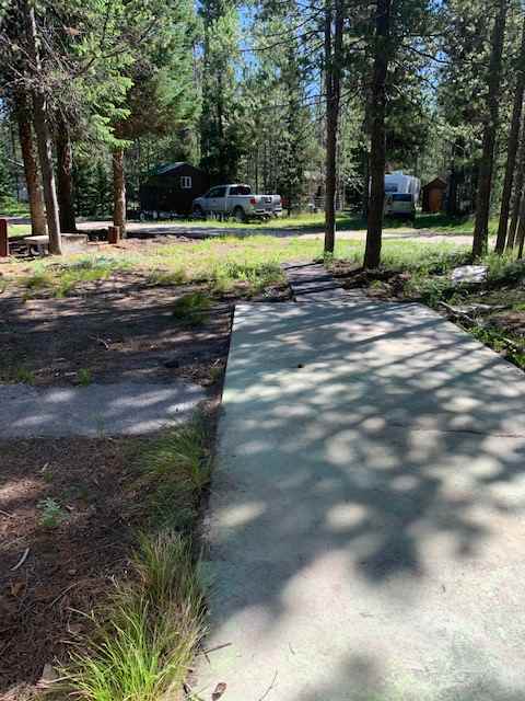 Concrete pad next to RV spot for all your stuff!