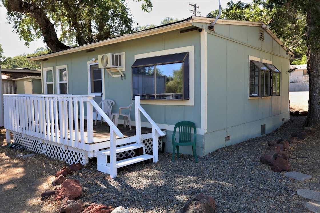 Back patio with view of the water has a door to the living room.