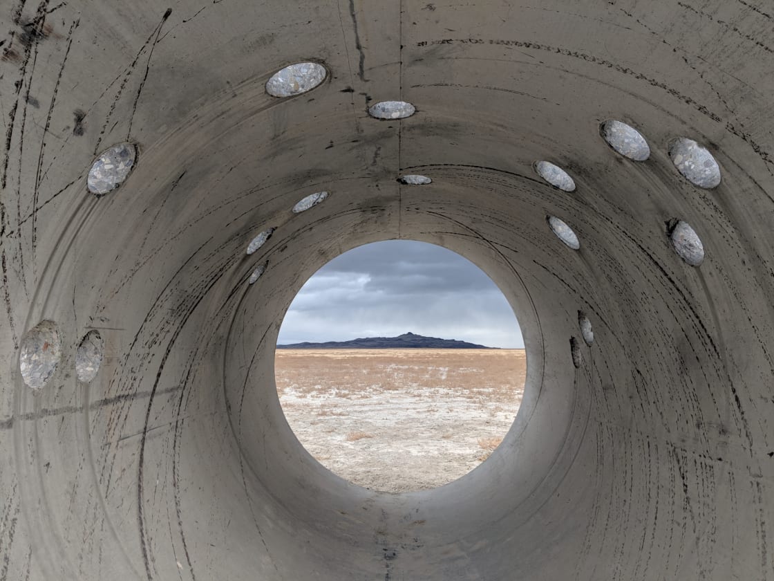 Nancy Holt's Sun Tunnels are human-scale in an incomprehensibly huge desert. The holes represent constellations, easily visible on a clear moonless night with our dark skies, and the mountains framed by the tunnels are where the sun rises, on the solstices.