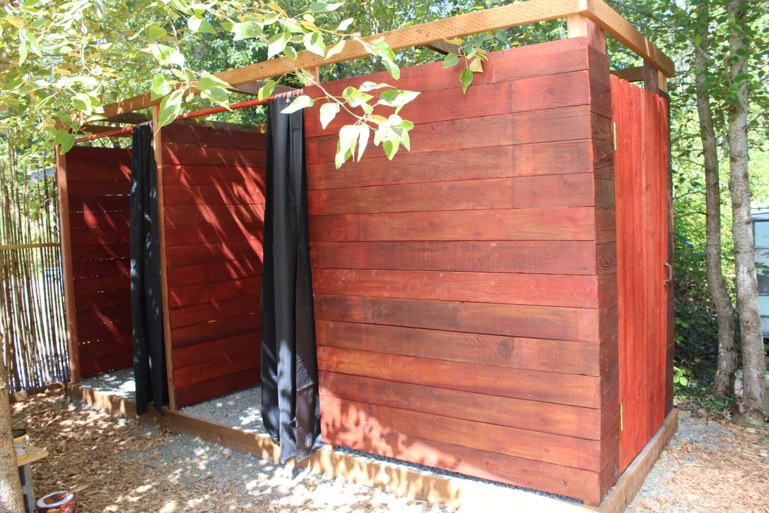 3 stalls brand new outdoor cedar showers.  Biodegradable soaps only.