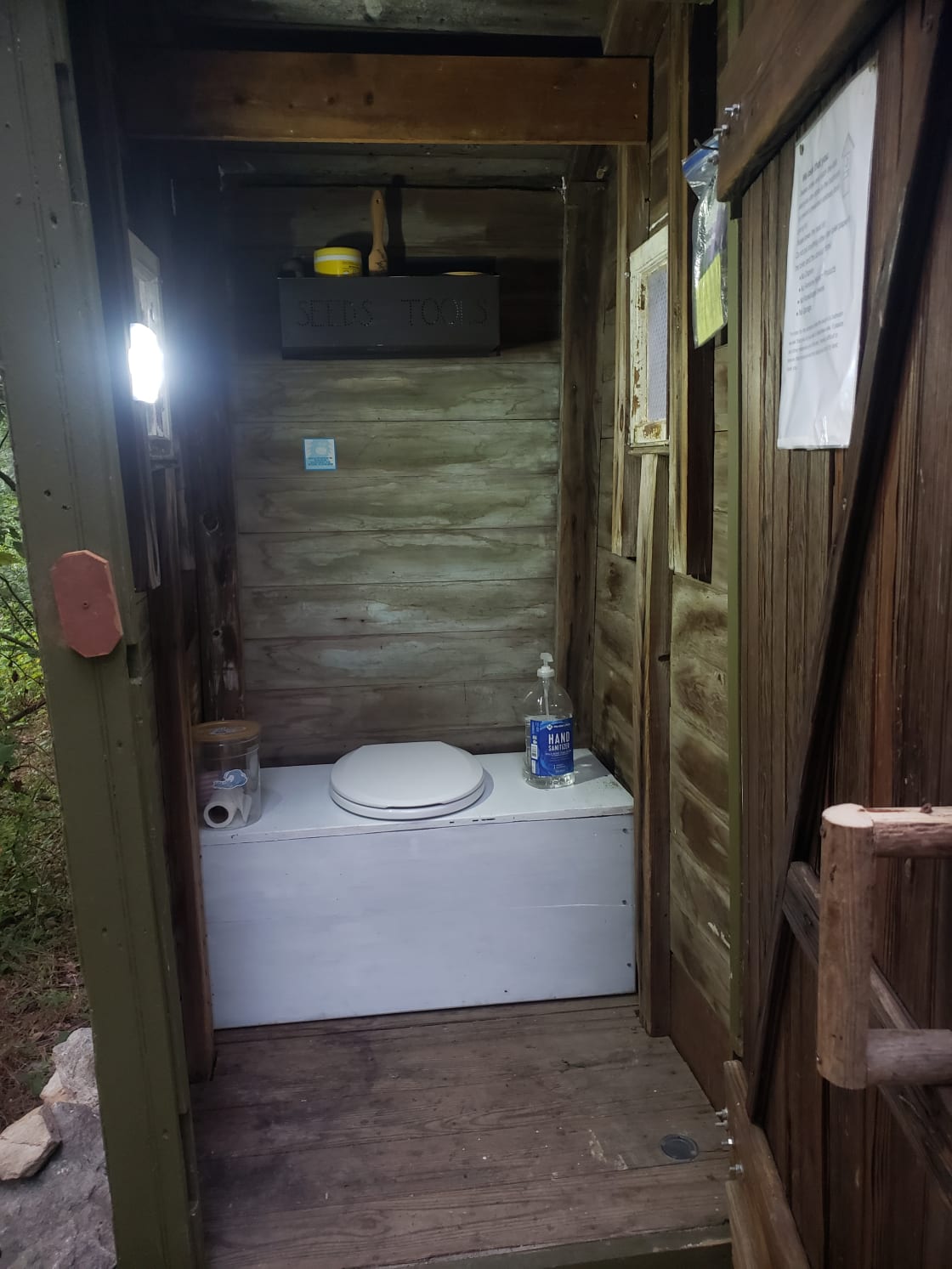 Nice and clean, we do provide toilet paper and clean the privy between campers. Also has a light and brocheures of things in the area.