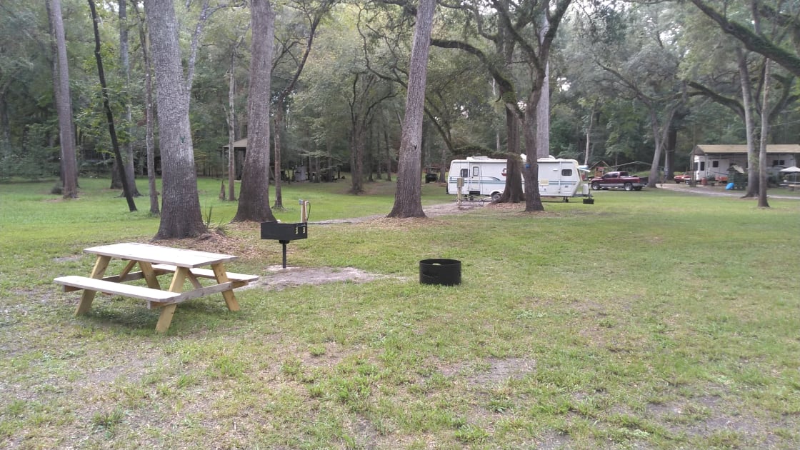 Picnic table and fire pit and grill