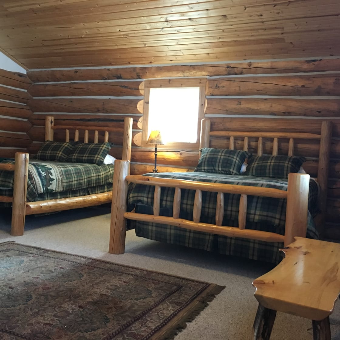 Two queen log beds in cabin. Great linens too. 