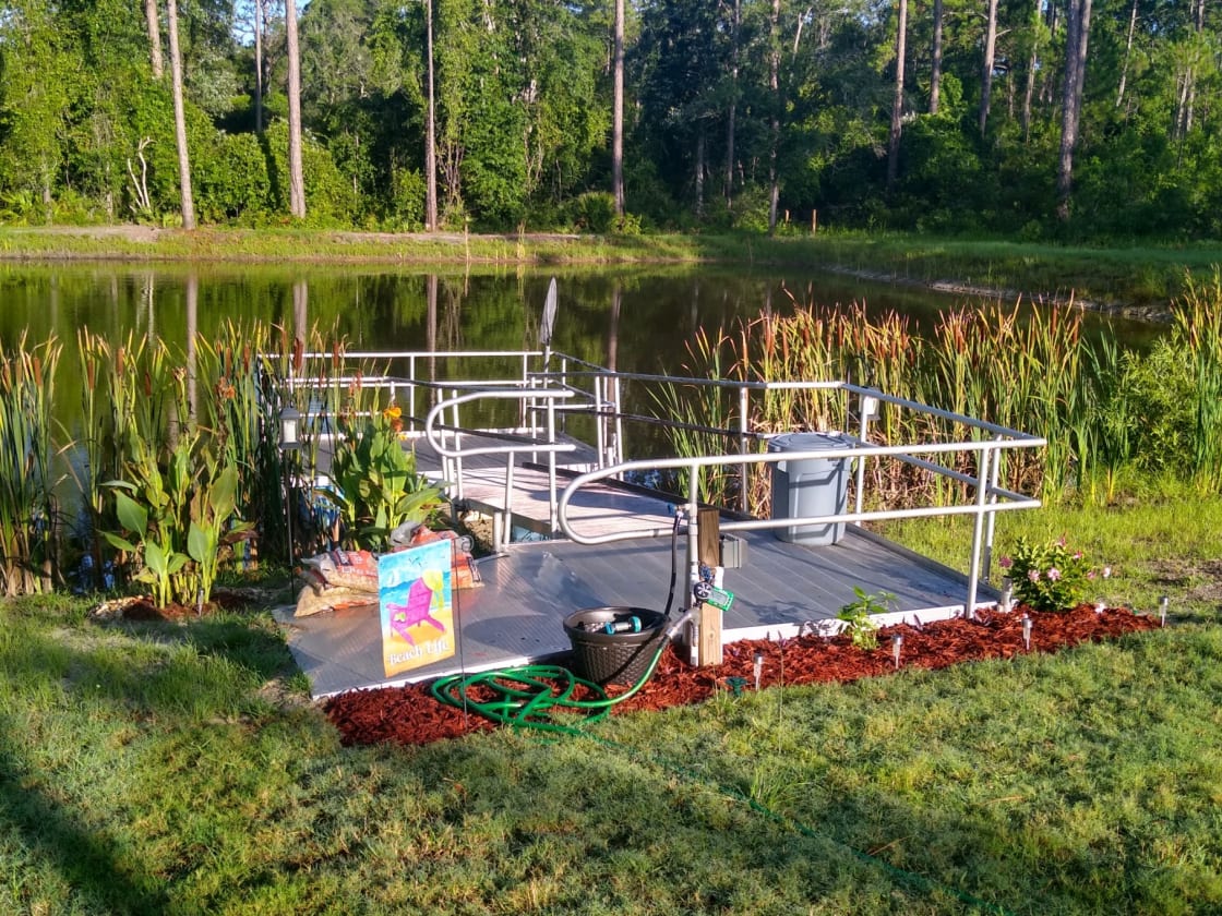 Our dock overlooking back fish pond.  Feel free to feed the fish!