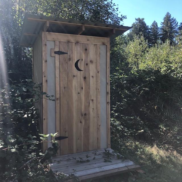 Clean compostable outhouse.
