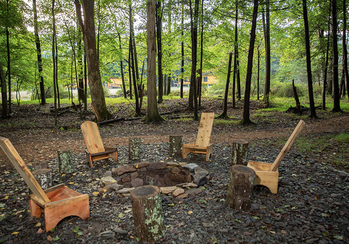We'll start your fire! Plus, we'll even bring the s'mores. One of our campfire spots along Sweet Root Creek.