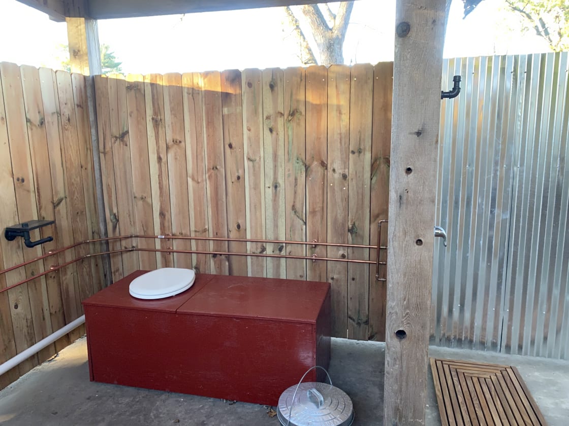 Composting toilet and hot shower